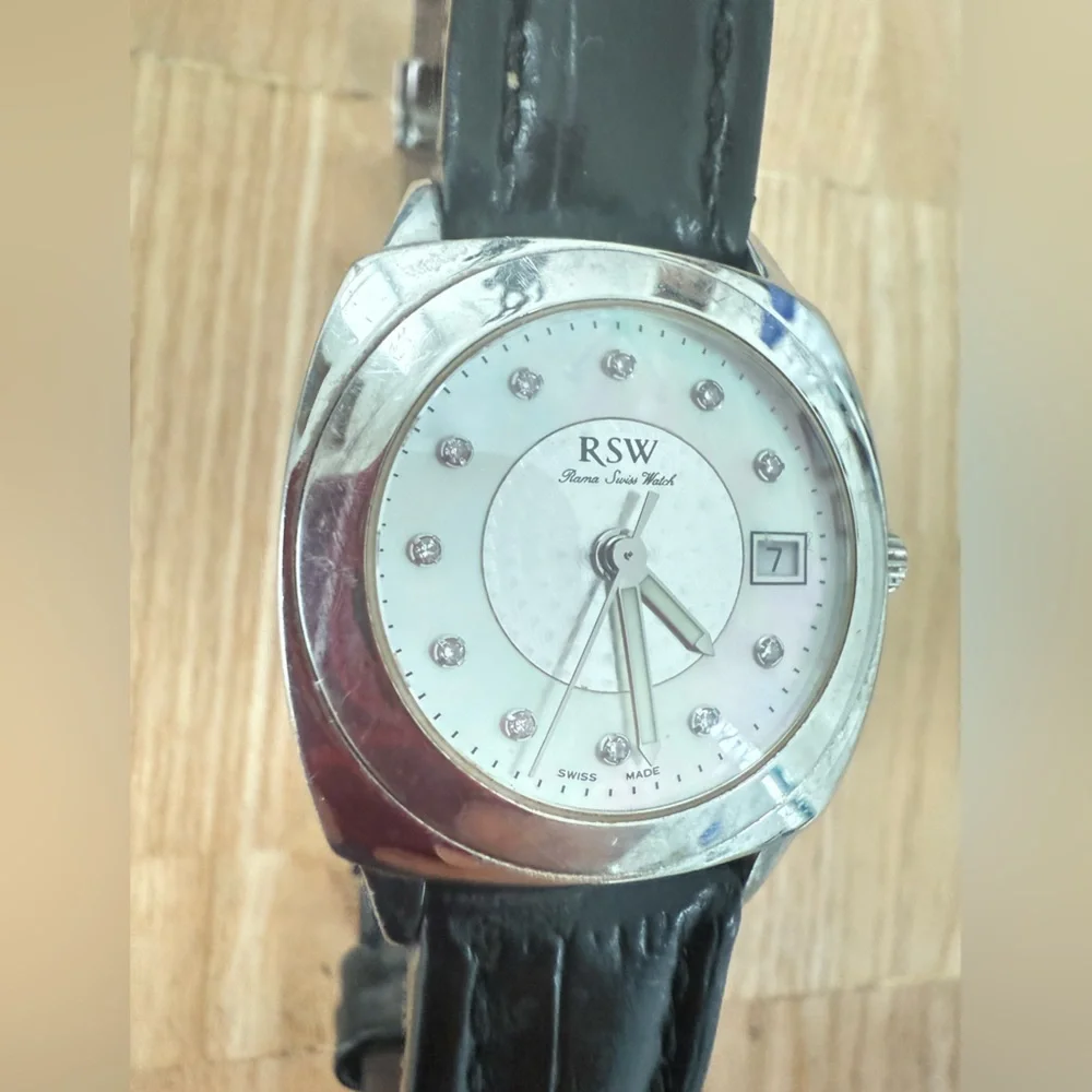 RSW ladies Roma Swiss silver tone black leather watch NEW BATTERY